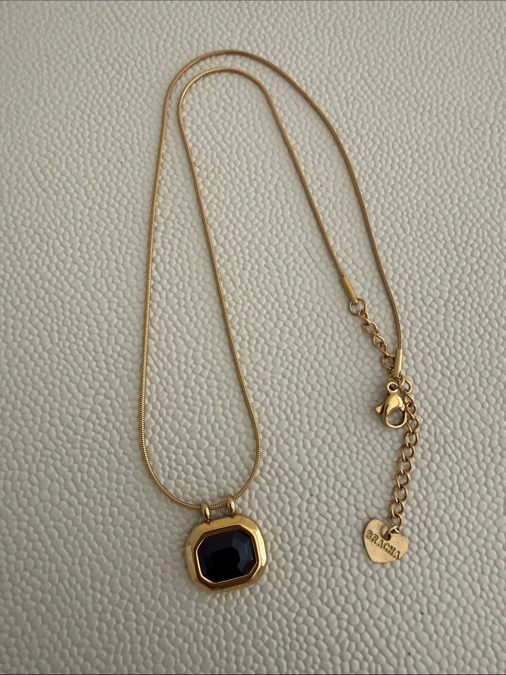 Gold Necklace with Black Stone Pendant -